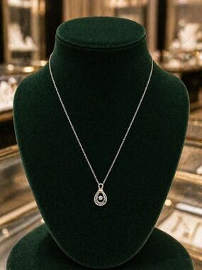 Sterling Silver 925 and 10kt  gold tear drop pendant with floating